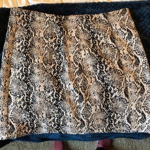 Free people tan and black snake print skirt